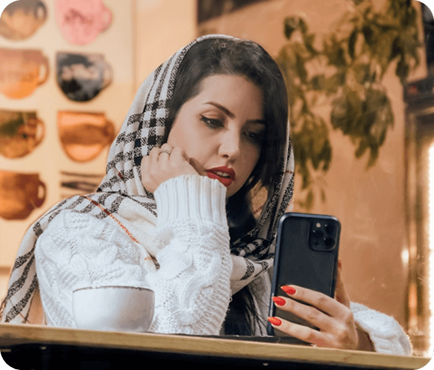A Mirantly user checking the status of her Canadian immigration case on her phone